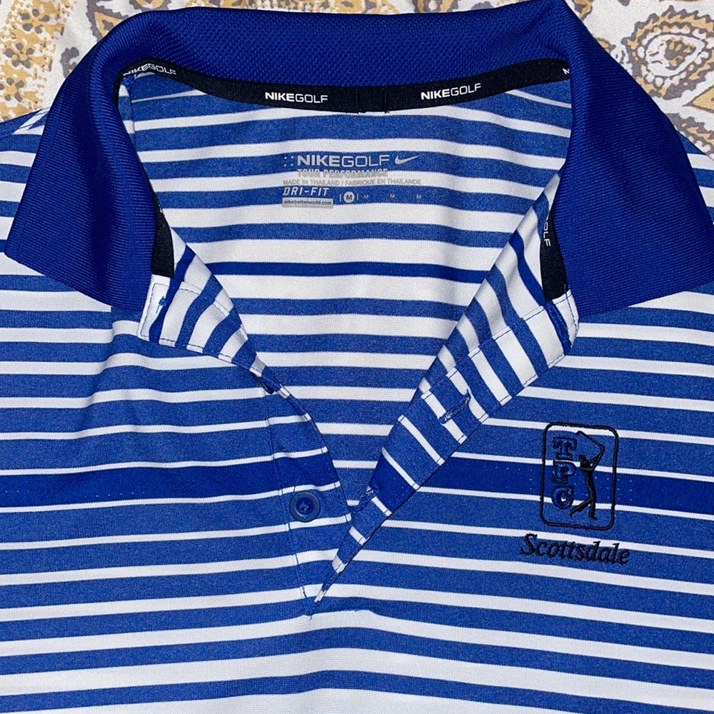 Blue and white striped Nike golf polo